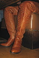 The crotch-high cowboy boots worn by Morris