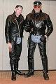 Leatherclad4U (right) with friend standing under the Hot Boots banner he  paid for
