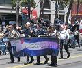 The banner is followed by the color guard
